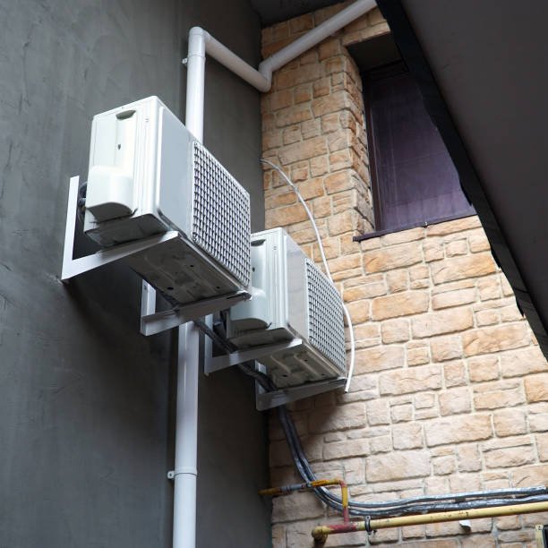 air conditioners on the wall of the building